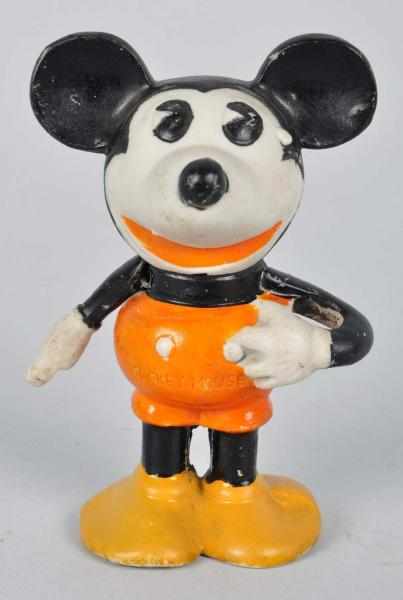 Appraisal: Walt Disney Mickey Mouse Holders Description Includes one bisque toothbrush