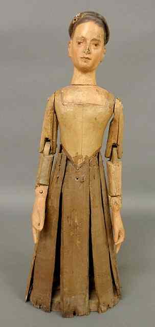 Appraisal: German carved dressmaker's doll late th c with articulated limbs