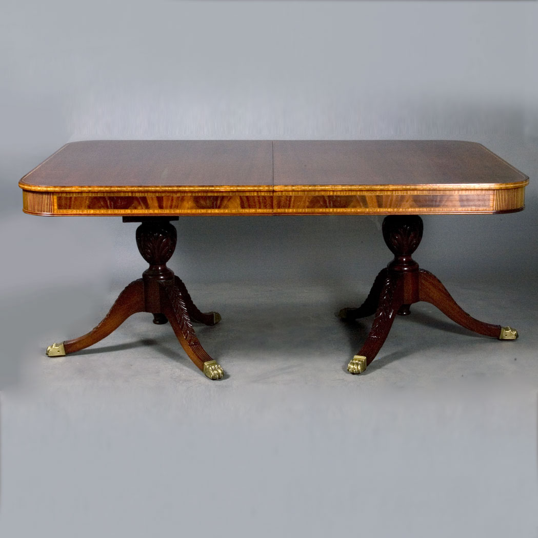 Appraisal: Georgian Style Banded Mahogany Double-Pedestal Dining Table With six leaves