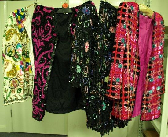 Appraisal: Three beaded jackets and one beaded outfit