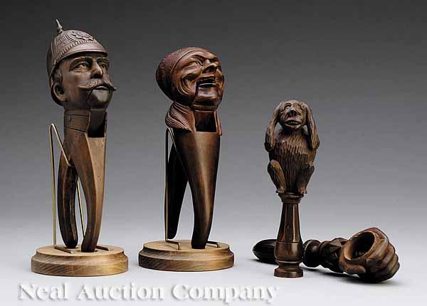 Appraisal: A Group of Four Carved Walnut Figural Nut Crackers early