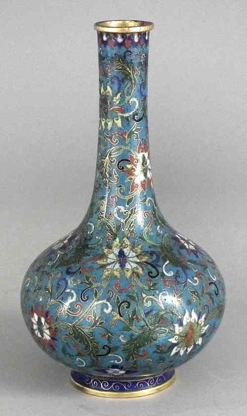 Appraisal: A Chinese bronze and cloisonne enamel bottle shaped vase decorated