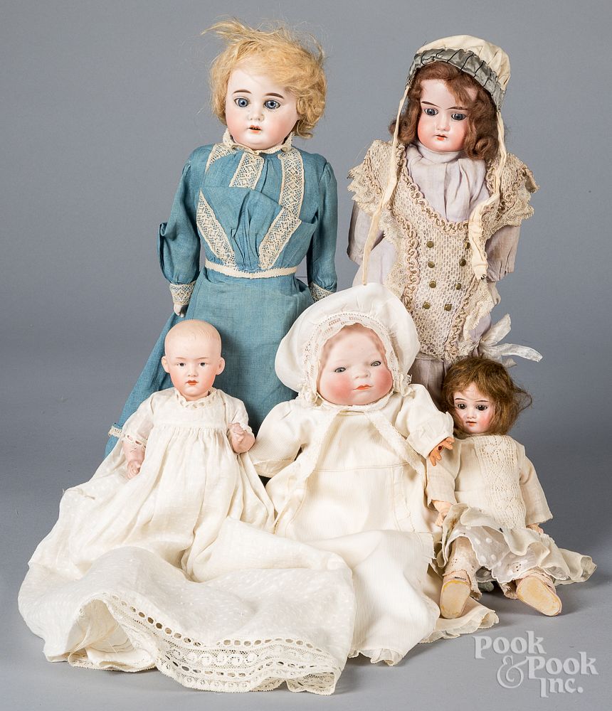 Appraisal: Five bisque head dolls Five bisque head dolls to include