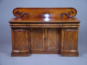 Appraisal: A Victorian mahogany sideboard the raised superstructure with applied double