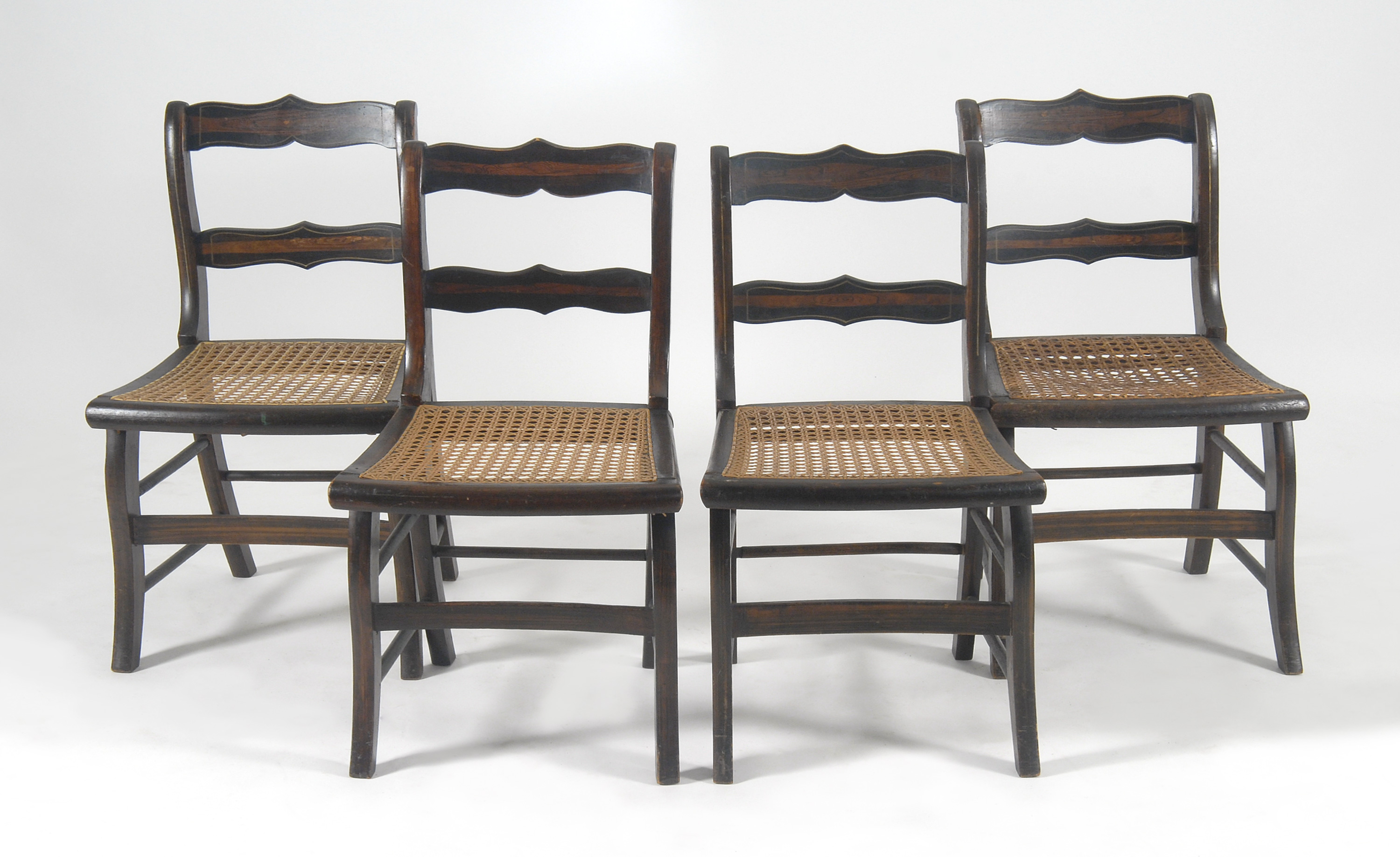 Appraisal: SET OF FOUR TH CENTURY SABER-LEG SIDE CHAIRS with grain-painted