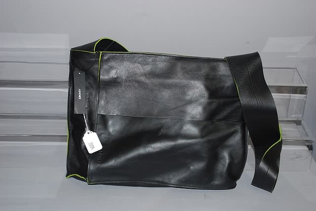 Appraisal: DKNY black with green trim leather shoulder handbag Neiman Marcus