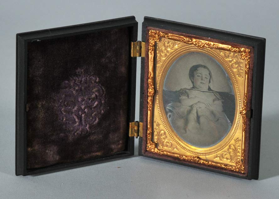 Appraisal: Mourning Ambrotype depicting a young girl with a gutta percha