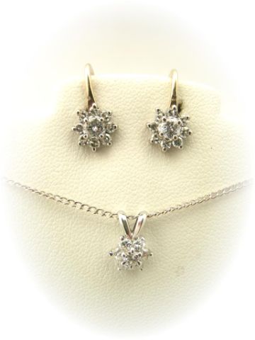 Appraisal: Lady's k two-tone gold diamond pendant and matching earrings in