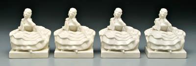 Appraisal: Two pairs Rookwood bookends seated woman holding fan white glaze