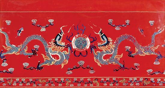 Appraisal: Framed Chinese tapestry fragment th century featuring twin dragons flanking