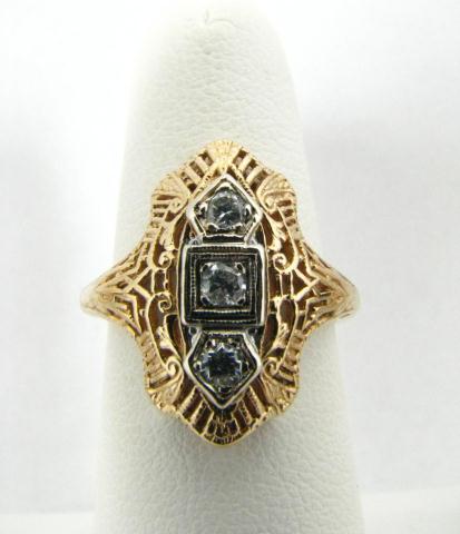 Appraisal: k two tone filigree tw diamond ring SRP- -