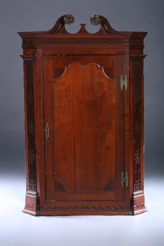 Appraisal: GEORGIAN MAHOGANY HANGING CORNER CUPBOARD th century in the Chinese