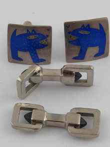 Appraisal: A pair of silver and enamel cufflinks together with a