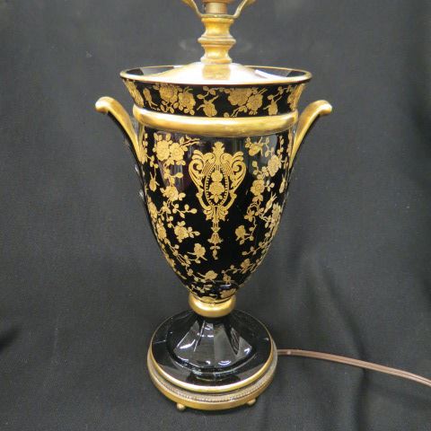 Appraisal: Cambridge Black Art Glass Rosepoint Lamp gold floral body scarce