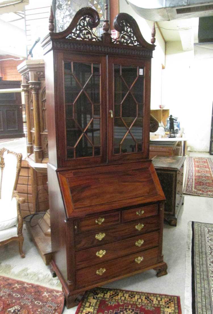 Appraisal: CARVED MAHOGANY SECRETARY BOOKCASE Chippendale style late th century having