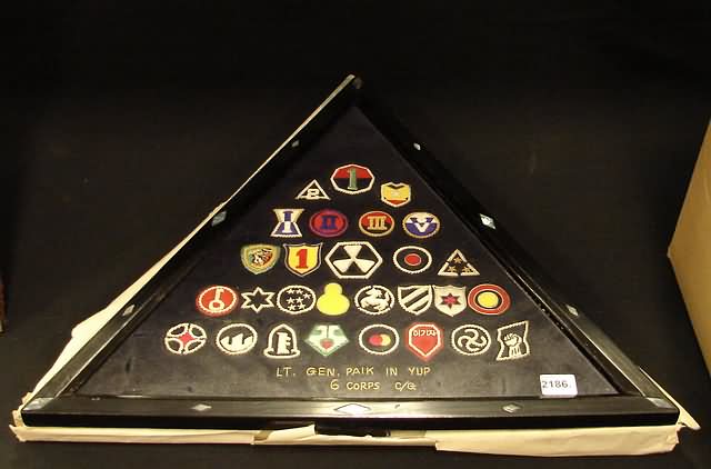 Appraisal: Framed triangular plaque displaying embroidered insignia of Republic of Korea