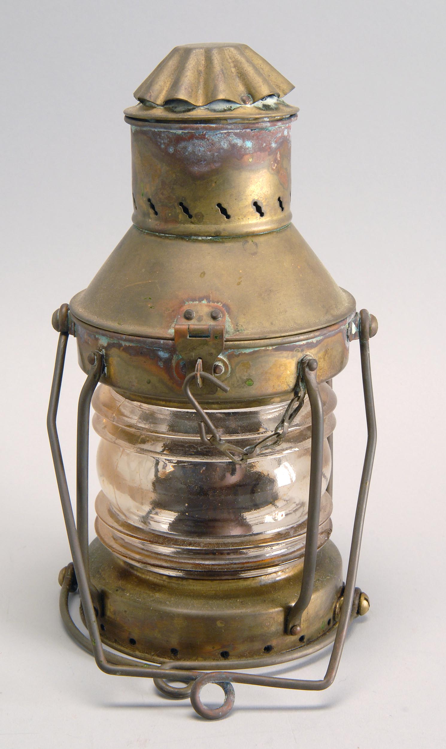 Appraisal: TH CENTURY SMALL BRASS MARINE LANTERN with clear fresnel lens