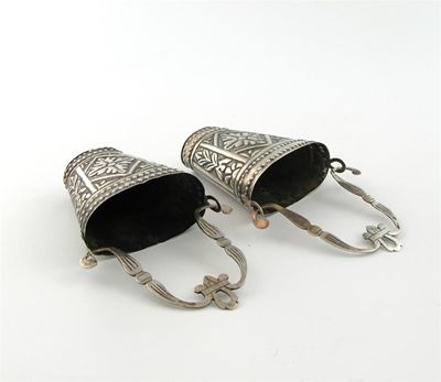 Appraisal: A pair of Spanish silver holy water stirrups tapering oval