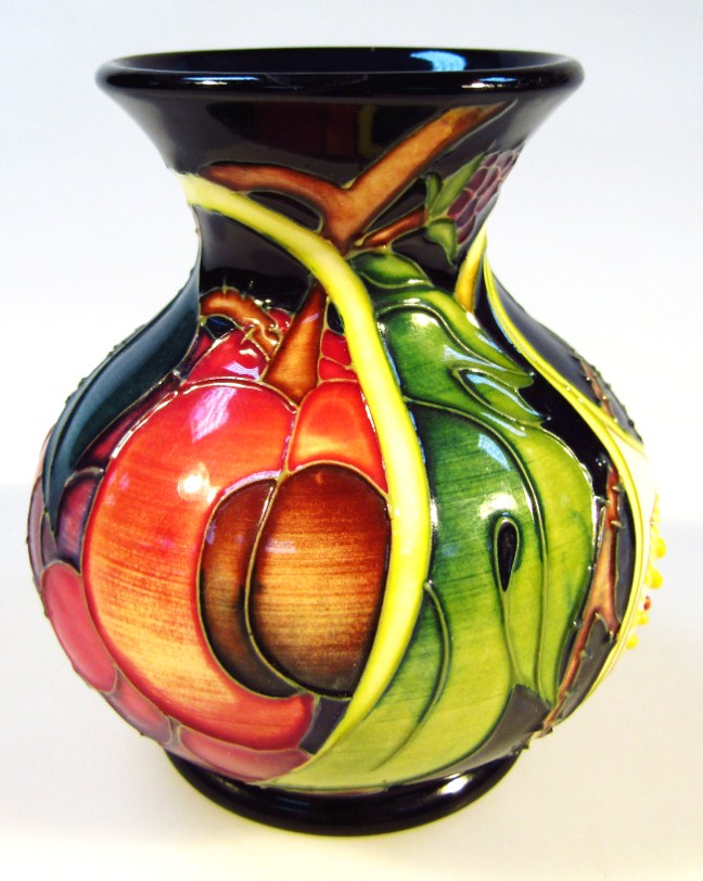 Appraisal: A modern Moorcroft Queen's Choice pattern vase printed and impressed