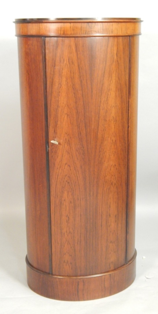 Appraisal: A 's rosewood bow fronted side cabinet the door enclosing