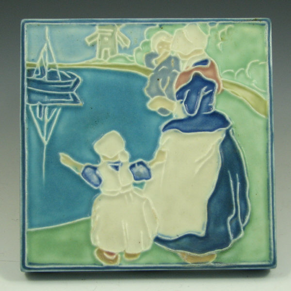 Appraisal: Rookwood Trivet w Dutch Woman Children Mint Rookwood trivet from