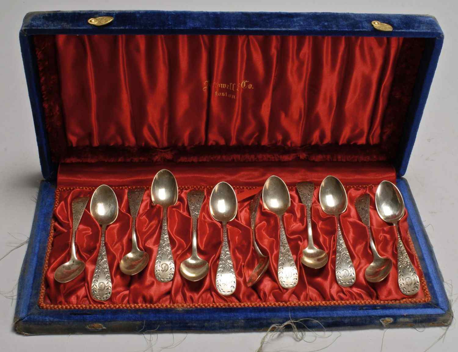 Appraisal: CASED SET OF TWELVE STERLING SILVER DEMITASSE SPOONSWith brite-cut floral