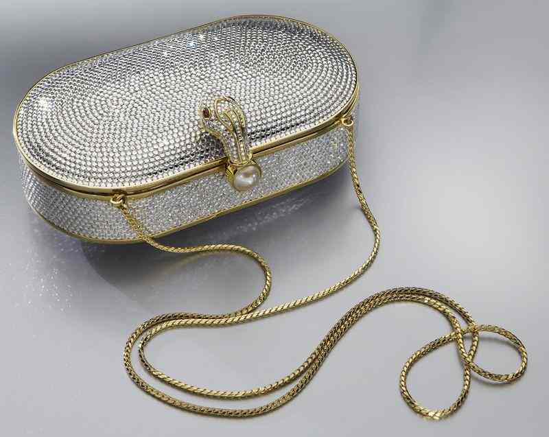 Appraisal: Judith Leiber rhinestone clutch evening pursetrimmed in gilt metal having