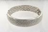 Appraisal: BRACELET - K white gold and diamond hinged bangle bracelet