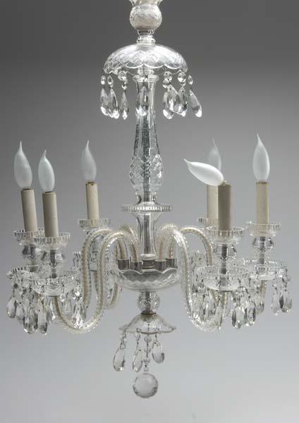 Appraisal: CRYSTAL CHANDELIER With six arms and pendant prisms Fixture