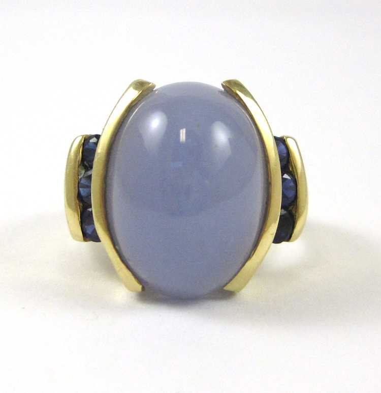 Appraisal: LAVENDER JADE AND FOURTEEN KARAT GOLD RING with three round-cut