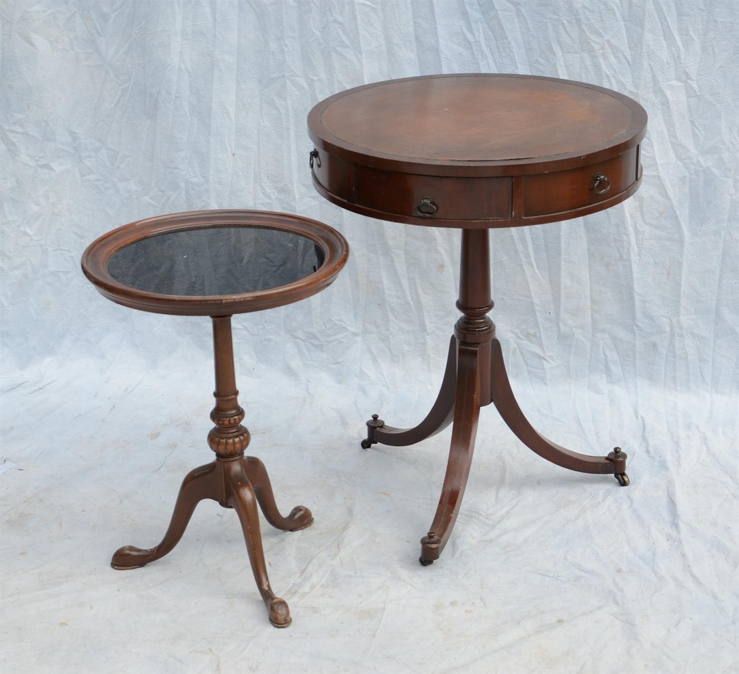 Appraisal: Leathertop round drum table together with a glass top candlestand