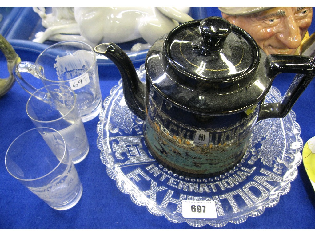 Appraisal: Glasgow Exhibition teapot glass plate and three assorted Glasgow Exhibition