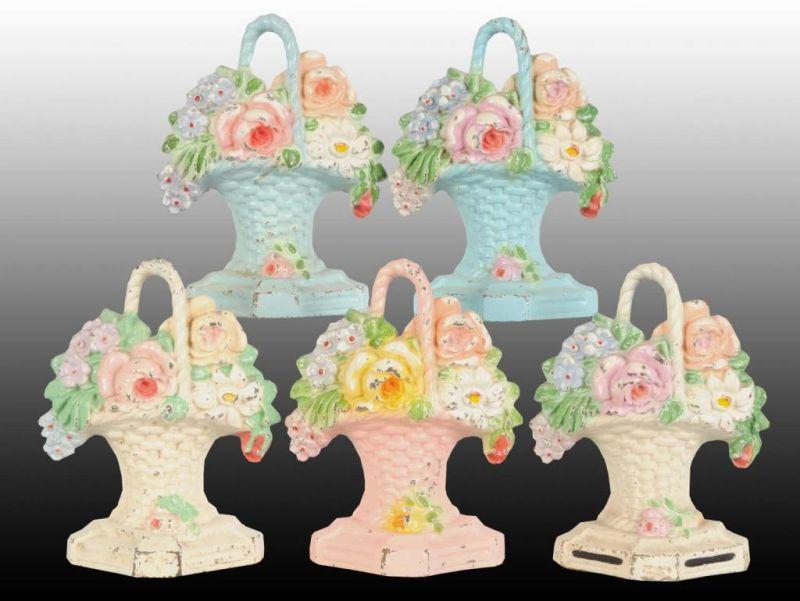 Appraisal: Assorted Mixed Flower Cast Iron Doorstop Bookends Description Lot of