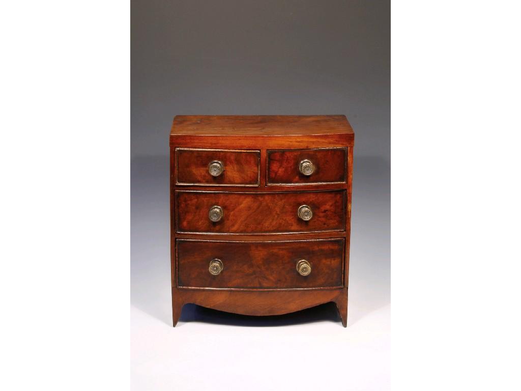 Appraisal: A LATE GEORGE III MINIATURE MAHOGANY BOWFRONT CHEST OF DRAWERS