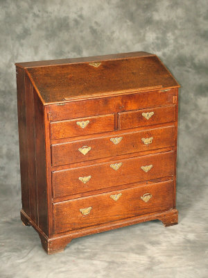 Appraisal: A Georgian oak bureau early th century and later elements