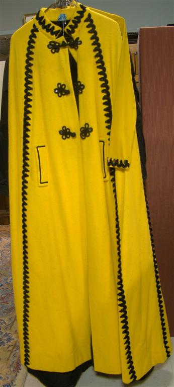 Appraisal: GROUP OF LADY'S CLOTHING Including a yellow felt opera cape