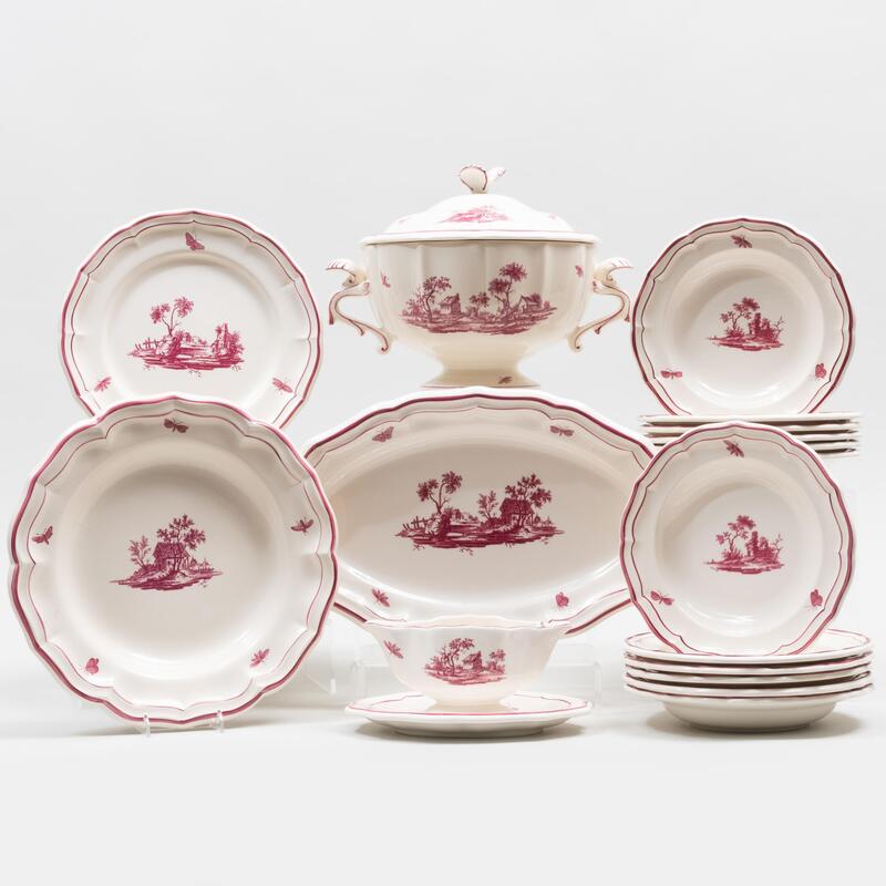 Appraisal: Gein Puce Decorated Porcelain Dinner Service in the 'Paysages Roses'