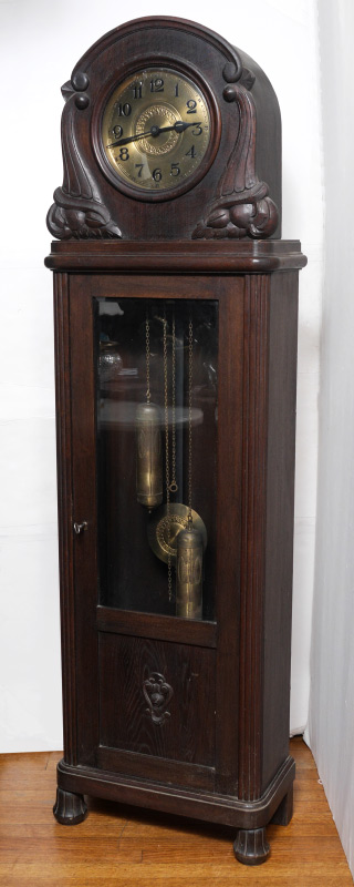 Appraisal: GERMAN OAK GRANDFATHER CLOCK Round top with carved decoration beveled