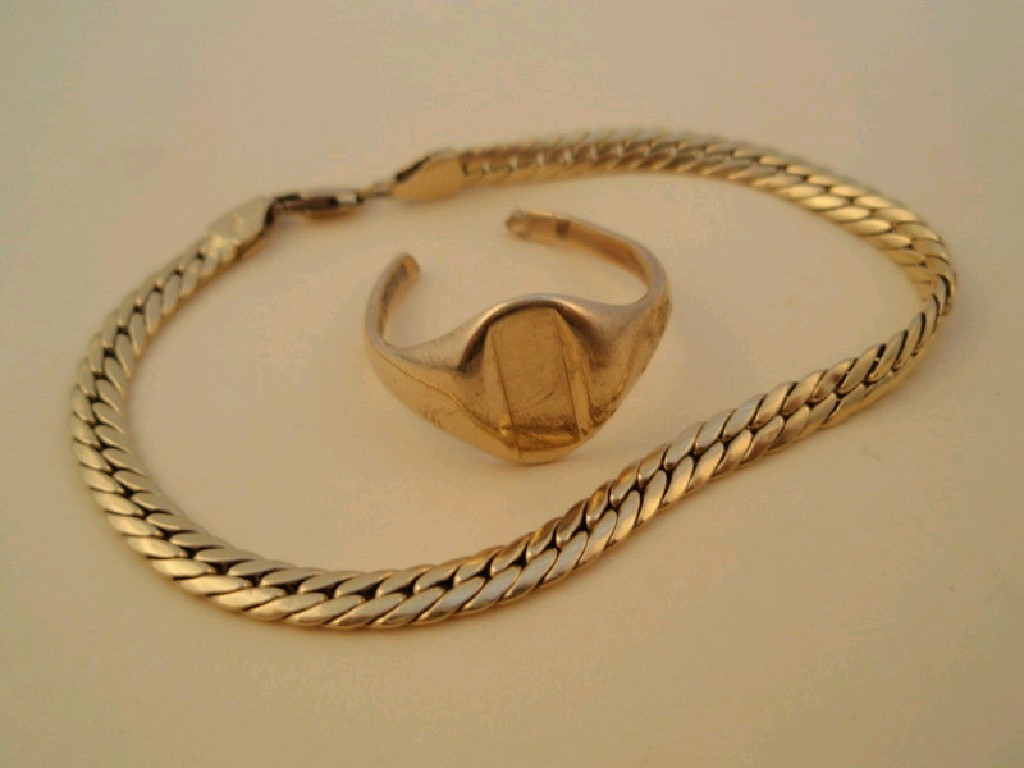 Appraisal: A snake bracelet stamped g and a broken ct ring