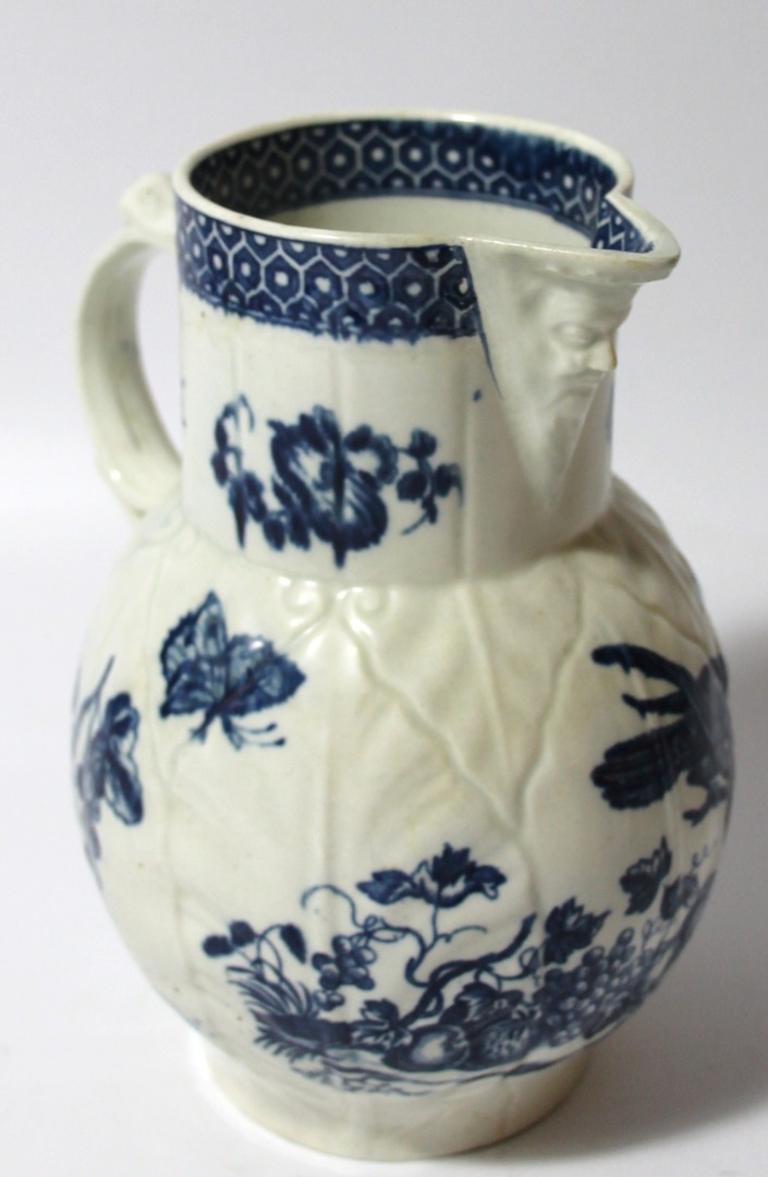 Appraisal: A late thC Caughley porcelain cabbage leaf jug with satyr