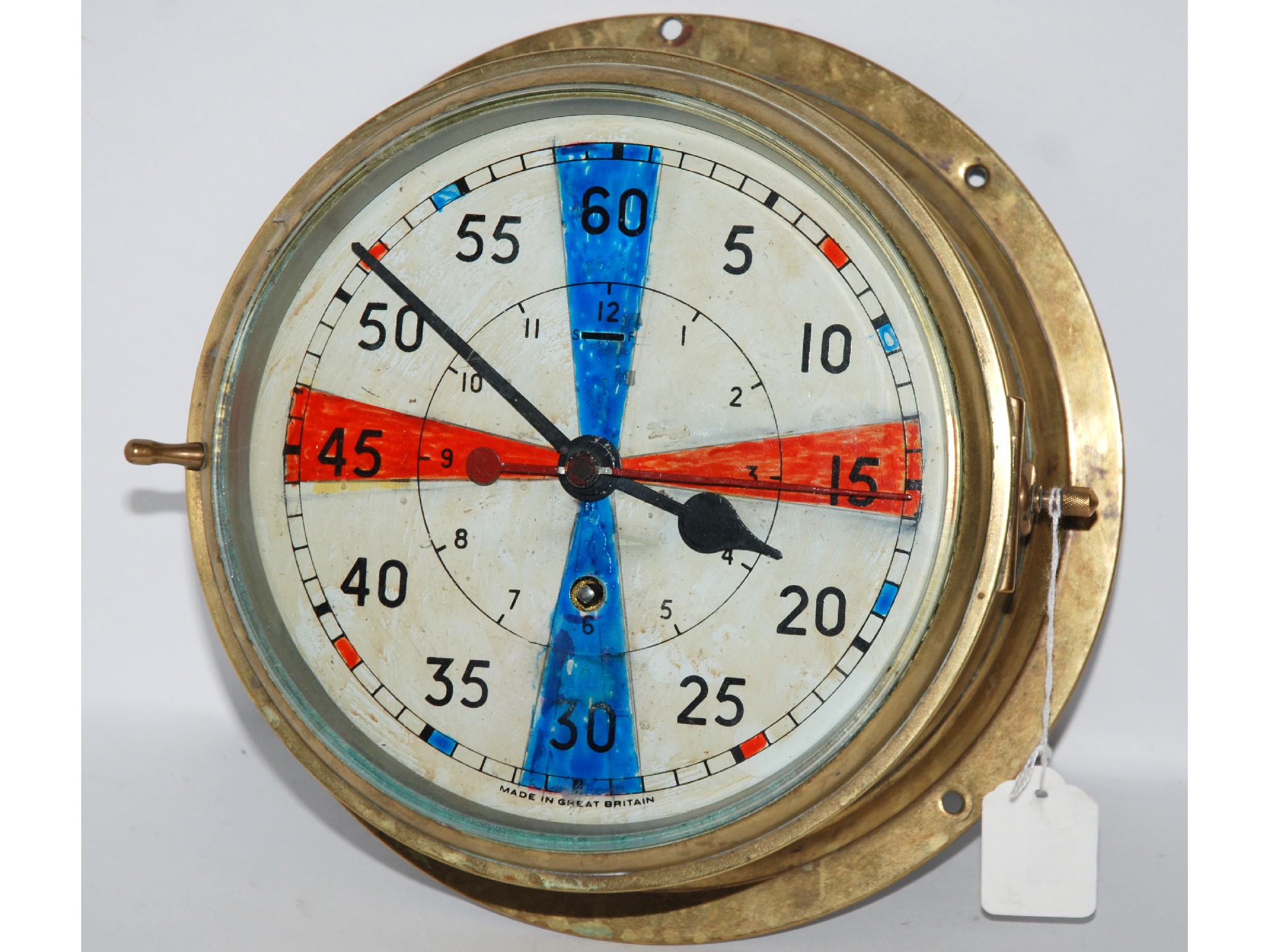 Appraisal: A ship's brass cased bulkhead clock with red enamel second