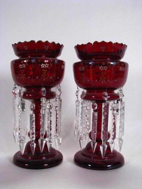 Appraisal: Pair of Victorian cranberry glass lustres enamel d cor with