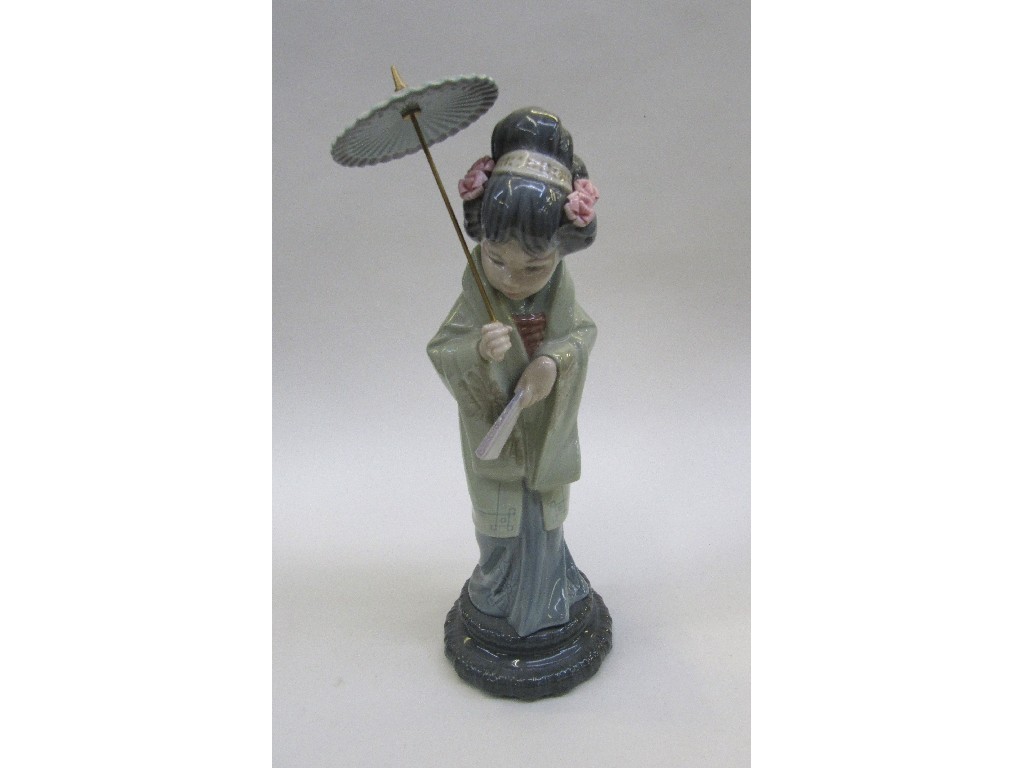 Appraisal: Lladro figure of a geisha holding a parasol