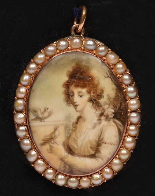 Appraisal: A TH CENTURY OVAL PAINTED GOLD PENDANT of oval form