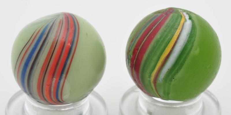 Appraisal: Lot of Banded Opaque Marbles Description Includes one light green