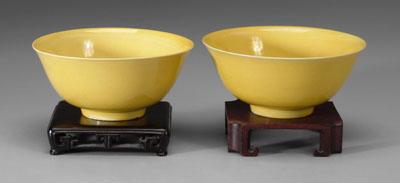 Appraisal: Pair Chinese yellow-glazed bowls rounded sides with everted rims slightly