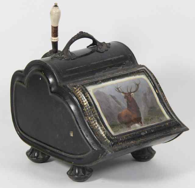 Appraisal: A painted tin coal scuttle set with a panel of