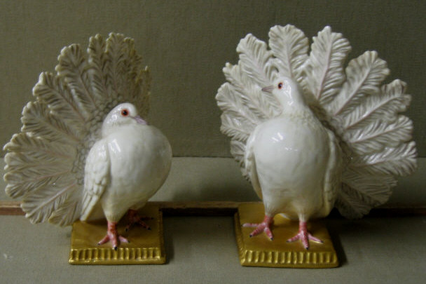 Appraisal: PAIR OF NYMPHENBURG PORCELAIN GAME BIRDS Royal Porcelain Manufactory late