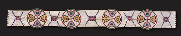 Appraisal: A Kiowa beaded blanket strip On buffalo hide with four