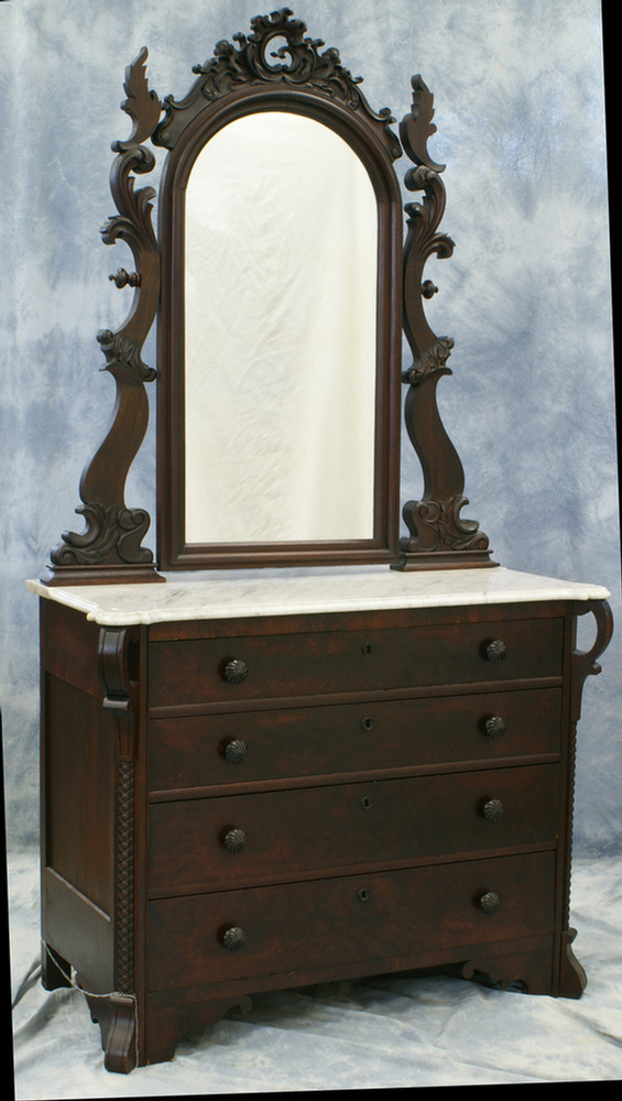 Appraisal: Carved walnut Victorian bureau with white marble top cookie corners